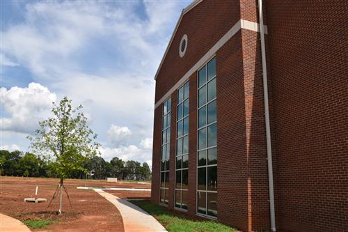 side view of building with landscaping